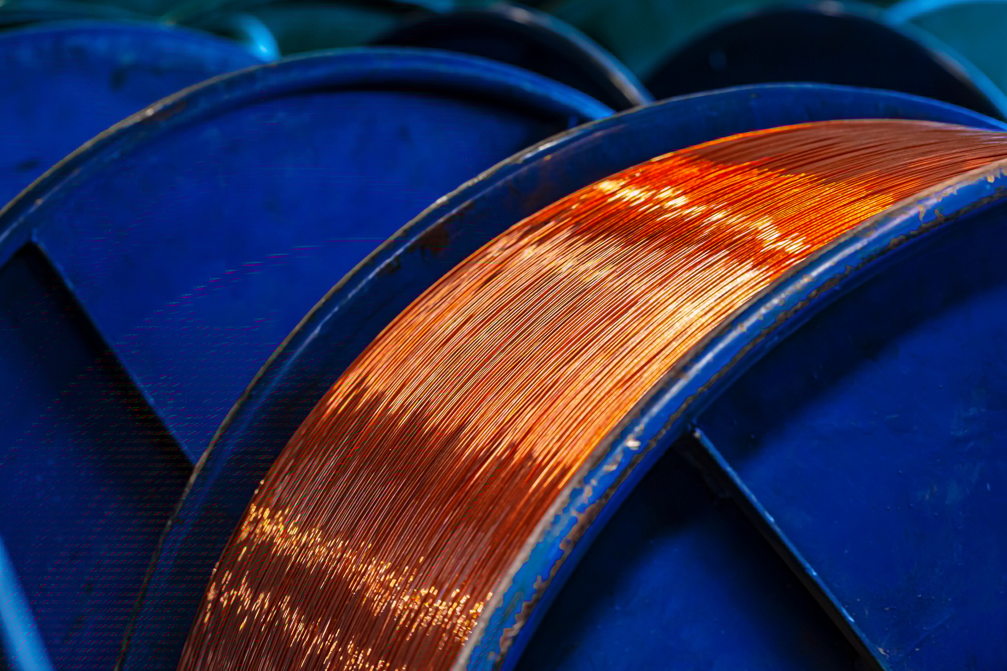Copper wire reels in cable factory close up