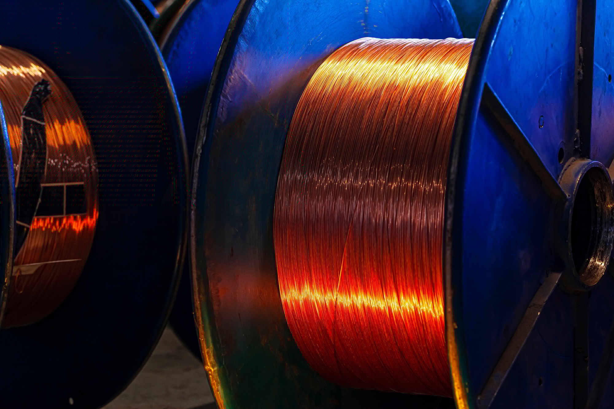 Copper wire reels in cable factory close up