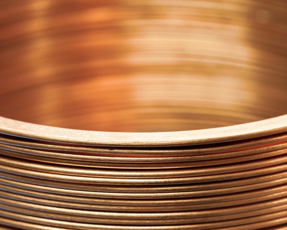 Close-up flat twisted copper wire at a factory