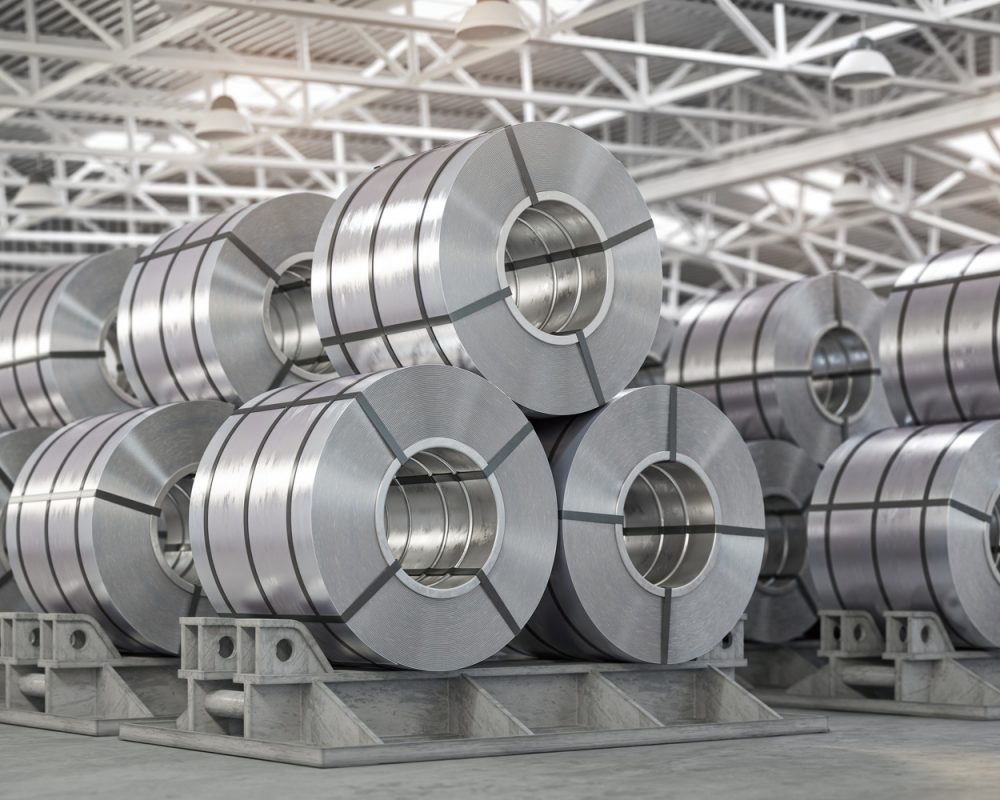 Rolls of metal sheet. Zinc, aluminium or steel sheet rolls on warehouse in factory.